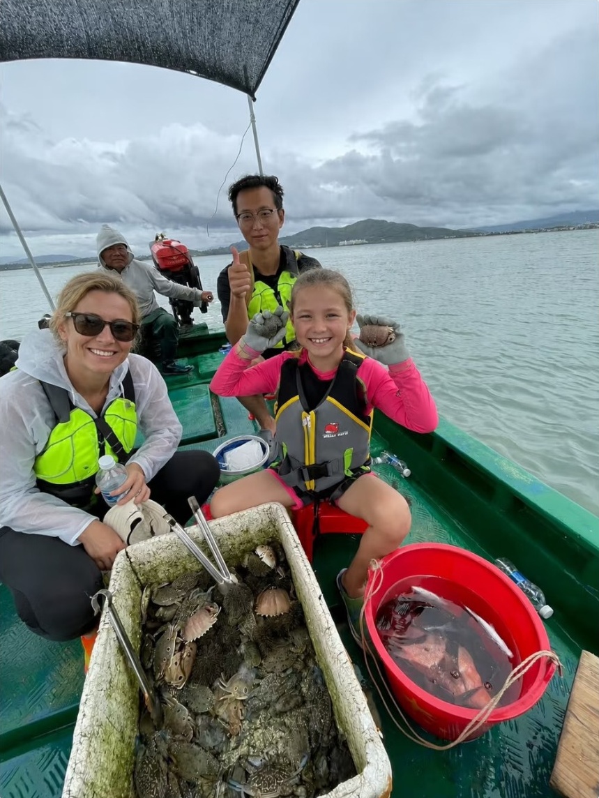 Boat seafood experience with guests